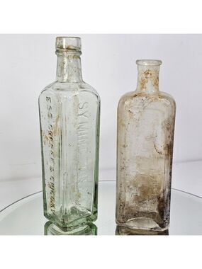 World Famous Blood Mixture Lincoln And ESS Coffee & Chicory Symington Bottles